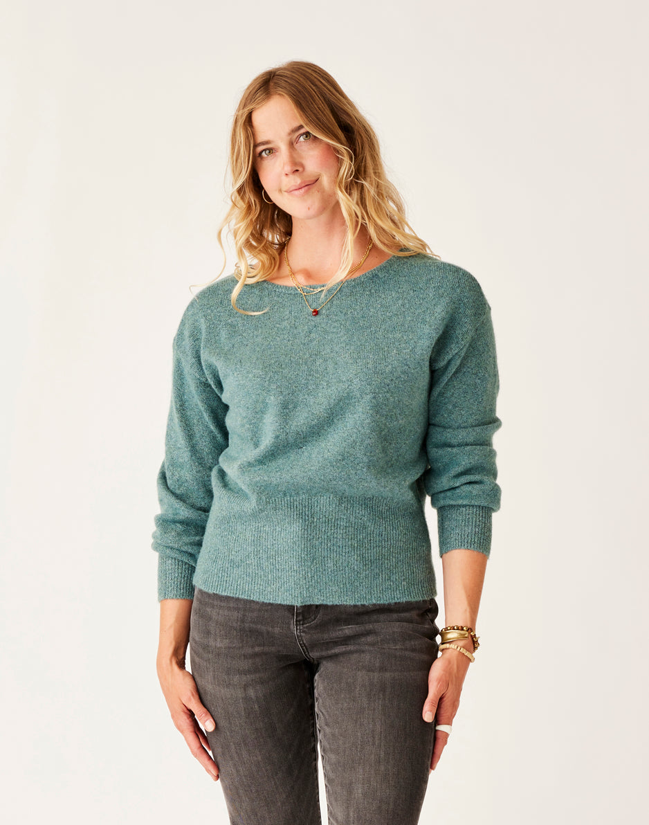 Super soft fuzzy v-neck sweater. This piece looks fantastic with 2024 a pair of jeans or dress pants